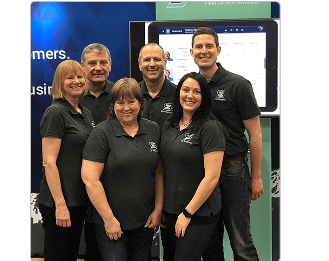 members of Zip Solutions sales, support and marketing teams at a trade-show